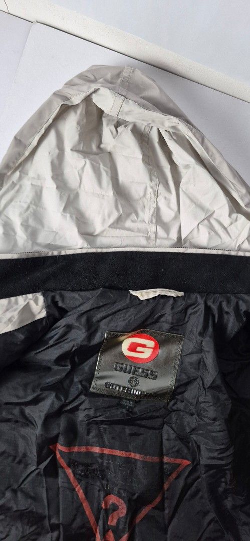 Guess Outerwear Puffer Jacket Vintage Y2K (Category: Coats, Jackets and Outerwear) located in Taguig. Submitted by regimennn (Listing ID 1462160680, Image 2). Description: - Vintage Y2K Guess Outerwear puffer jacket - Size L dimensions: 24 x 30 - Zip-up front with stand-up collar - All-over quilted design.