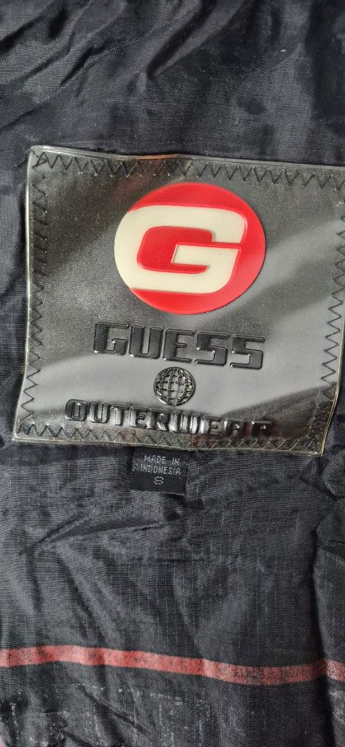 Guess Outerwear Puffer Jacket Vintage Y2K (Category: Coats, Jackets and Outerwear) located in Taguig. Submitted by regimennn (Listing ID 1462160680, Image 3). Description: - Vintage Y2K Guess Outerwear puffer jacket - Size L dimensions: 24 x 30 - Zip-up front with stand-up collar - All-over quilted design.