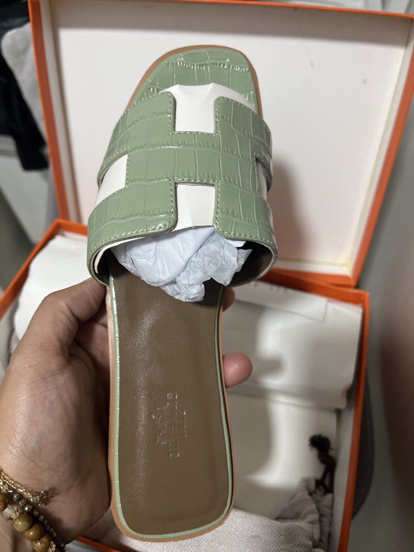 H Sandals Size 39 Mint Green (Category: Flats & Sandals) located in Pasig City. Submitted by melaiski28 (Listing ID 1462113357, Image 1). Description: - Hermes Izmir Sandals - Color: Mint Green - Size: 39 - Made in Italy - Material: Leather sole - Includes: Original box and dust bag - Style: Super comfy slides, perfect for casual wear.