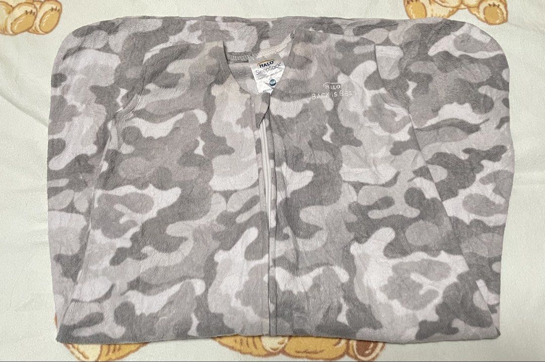 HALO SleepSack Wearable Blanket Bundle - Various Prints (Category: Babies & Kids Fashion) located in San Jose del Monte. Submitted by momma_buys (Listing ID 1462114001, Image 3). Description: - Bundle of three HALO SleepSack wearable blankets - Includes: grey camouflage, light blue textured, and grey with white dog faces prints - Sleeveless design for safe sleep - Convenient top-to-bottom zipper - Keeps your little one warm and cozy.