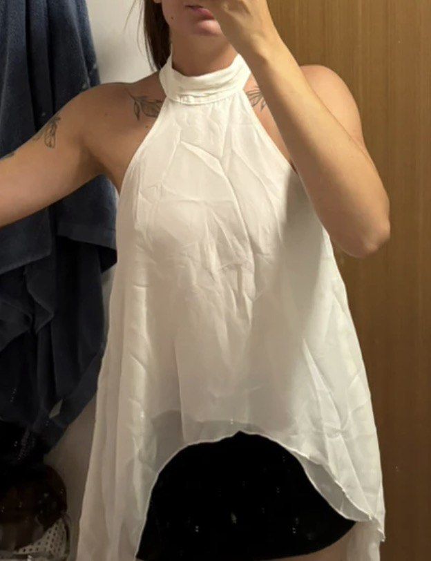 HALTER NECK WATERFALL TOP (Category: Sleeveless) located in Batangas. Submitted by nishiaoui_04 (Listing ID 1462145642, Image 1). Description: Condition: Good condition 📌 No visible major stains or damage 📌 Actual item is shown in the photos 📌 Size Xs - Large 📌 Brand New (never been worn) 📌 From Shein - 💌 Message me for measurements or additional photos! RFS: decluttering / no longer used.