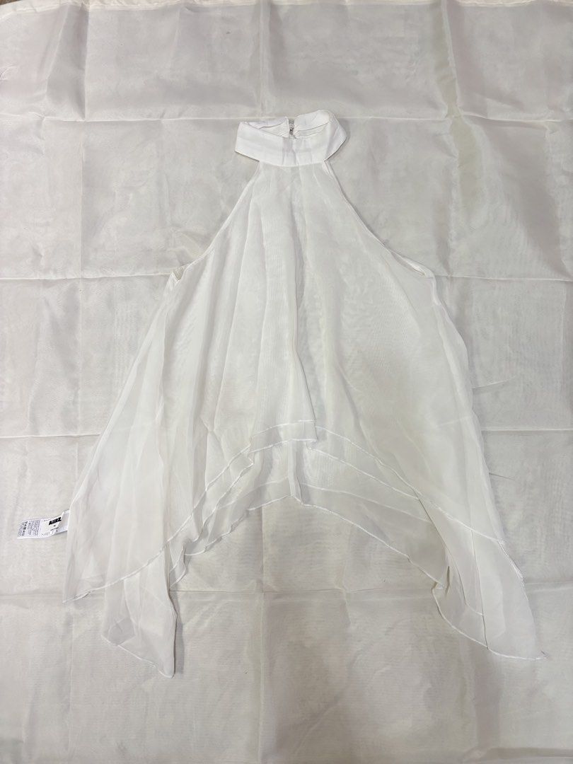 HALTER NECK WATERFALL TOP (Category: Sleeveless) located in Batangas. Submitted by nishiaoui_04 (Listing ID 1462145642, Image 2). Description: Condition: Good condition 📌 No visible major stains or damage 📌 Actual item is shown in the photos 📌 Size Xs - Large 📌 Brand New (never been worn) 📌 From Shein - 💌 Message me for measurements or additional photos! RFS: decluttering / no longer used.