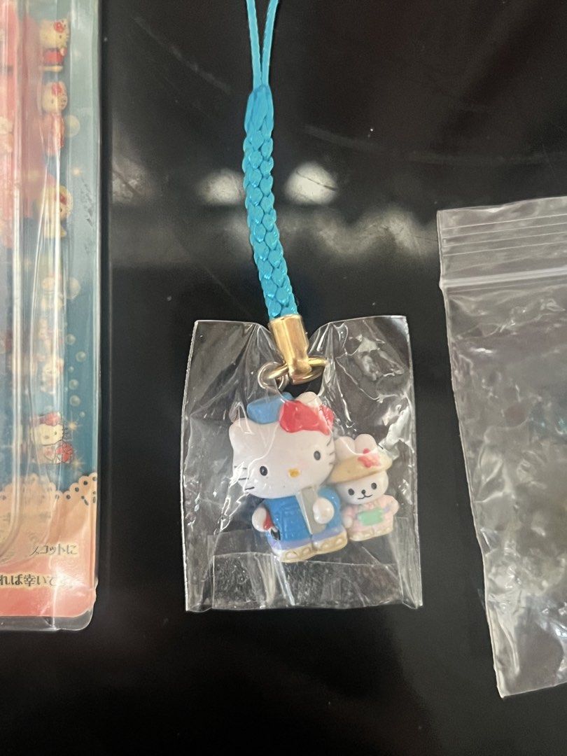 Hello Kitty Gotochi Charms Set (Category: Other Stationery & Craft) located in Manila. Submitted by seajeily (Listing ID 1462053329, Image 3). Description: Set of 3 cute Kitty charms • 1 Premium 10th Anniversary Edition (still in original packaging) • 2 individual charms with straps: one with a mouse friend, one with a bell and flower 💰 Price is negotiable MOP: GCash or Maribank MOD: Lalamove/Grab/Angkas • Meetup: DLSU Gates .