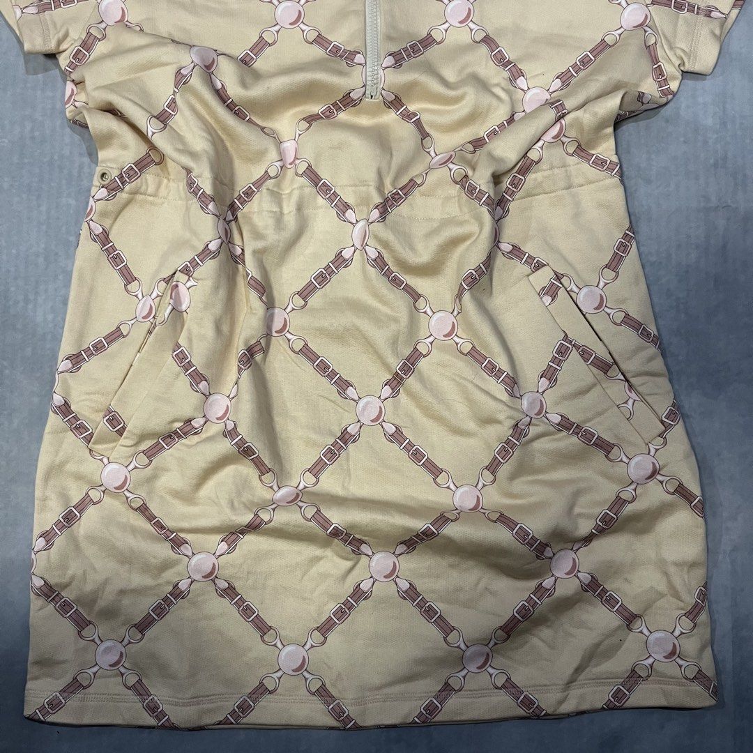 HERMES Beige Dress with Horse Bit Pattern (Category: Dresses) located in Dumaguete. Submitted by deniokthrift (Listing ID 1462162125, Image 3). Description: - Beige short sleeve dress - Repeating horse bit and strap pattern - Quarter zip neckline - Convenient side pockets Grand tralala robe dress W21 L33.4 Excellent condition No lace/cut tags Last pic for reference only .