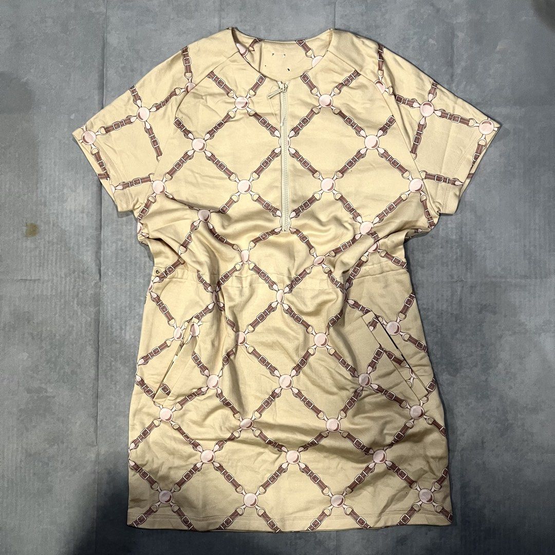 HERMES Beige Dress with Horse Bit Pattern (Category: Dresses) located in Dumaguete. Submitted by deniokthrift (Listing ID 1462162125, Image 1). Description: - Beige short sleeve dress - Repeating horse bit and strap pattern - Quarter zip neckline - Convenient side pockets Grand tralala robe dress W21 L33.4 Excellent condition No lace/cut tags Last pic for reference only .