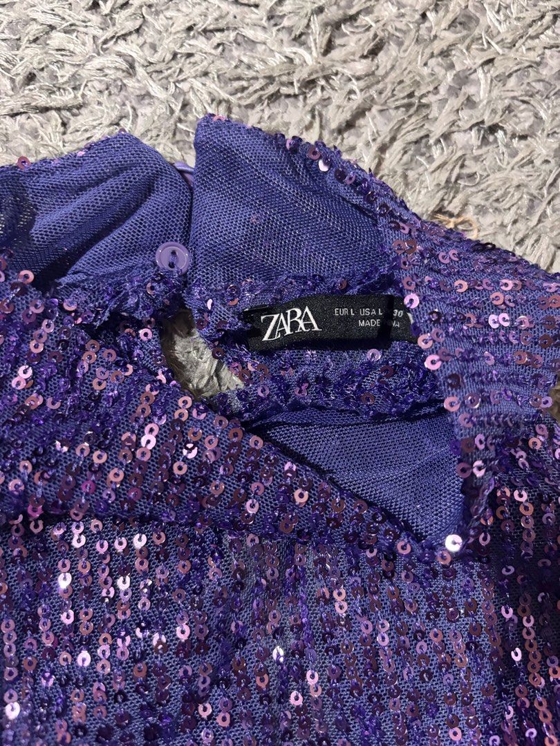 High neck purple top (Category: Sleeveless) located in Manila. Submitted by kattlacsamana (Listing ID 1462146380, Image 2). Description: vibrant purple, sleeveless high-neck top covered entirely in shimmering sequins 💜 Condition: Like new Brand: Zara Size: S-M .