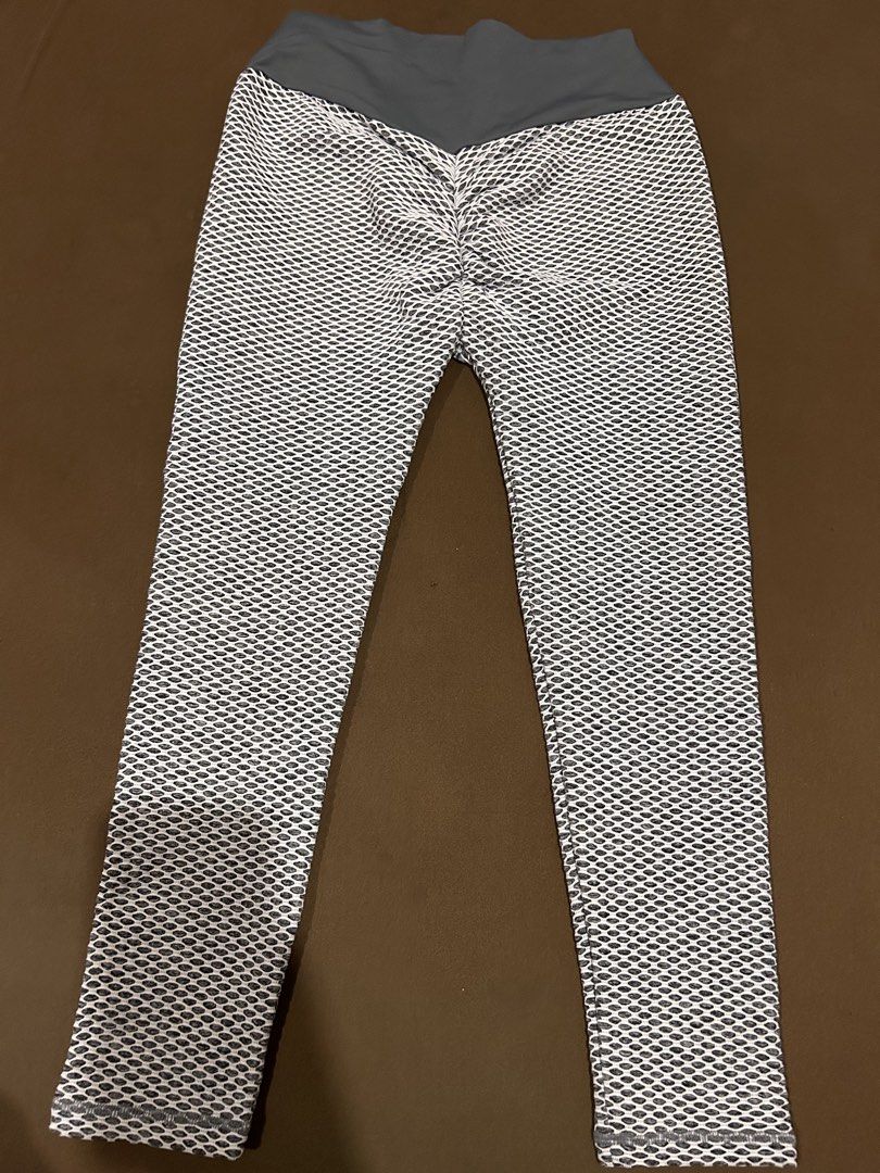 High-Waisted Leggings with Ruched Butt (Category: Activewear) located in Caloocan City. Submitted by declutterieee (Listing ID 1462258161, Image 3). Description: - Grey and white textured leggings - High-waisted fit - Ruched detail at the back to enhance shape - Stretchy and comfortable material - Versatile for workouts or casual wear - Size L.