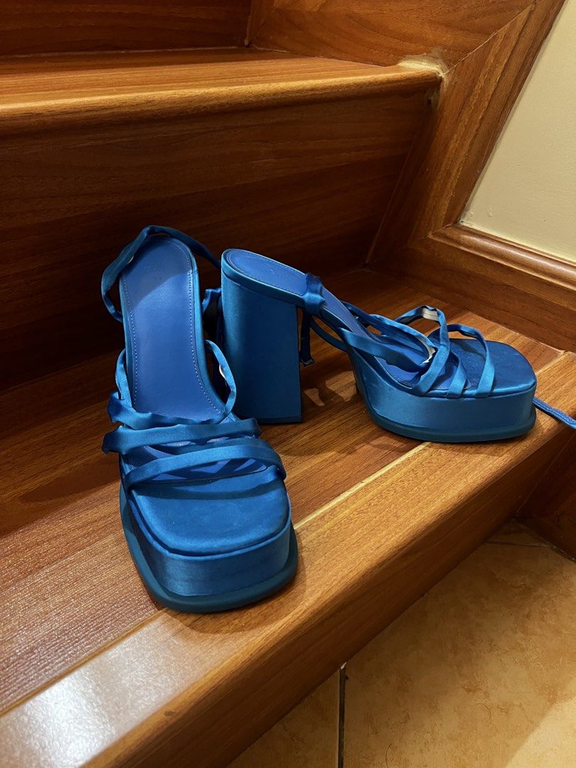 H&M Blue Satin Platform Strappy Heels (Category: Heels) located in Taguig. Submitted by banannananas (Listing ID 1462207151, Image 2). Description: - Brand: H&M - Color: Blue - Material: Satin - Style: Platform heels - Features: Strappy design, tie-up ankle strap, chunky block heel - Condition: Brand new, never worn - Perfect for: Dressing up outfits.