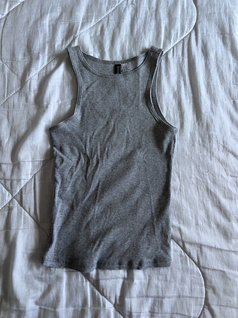 H&M Grey Long Ribbed Tank Top (Category: Sleeveless) located in Taguig. Submitted by gingerderp (Listing ID 1462136045, Image 1). Description: Perfect for the HOT weather! Gives you that effortlessly cool vibe and goes well with anything you pair it with :).