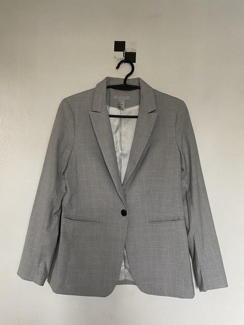 H&M Grey Plaid Single Button Blazer (Category: Coats, Jackets and Outerwear) located in Makati City. Submitted by tors.villa (Listing ID 1462042628, Image 1). Description: - H&M Grey Plaid Blazer - Single button closure - Two flap pockets - Fully lined interior - Cuff buttons - Ideal for work or smart casual outfits.