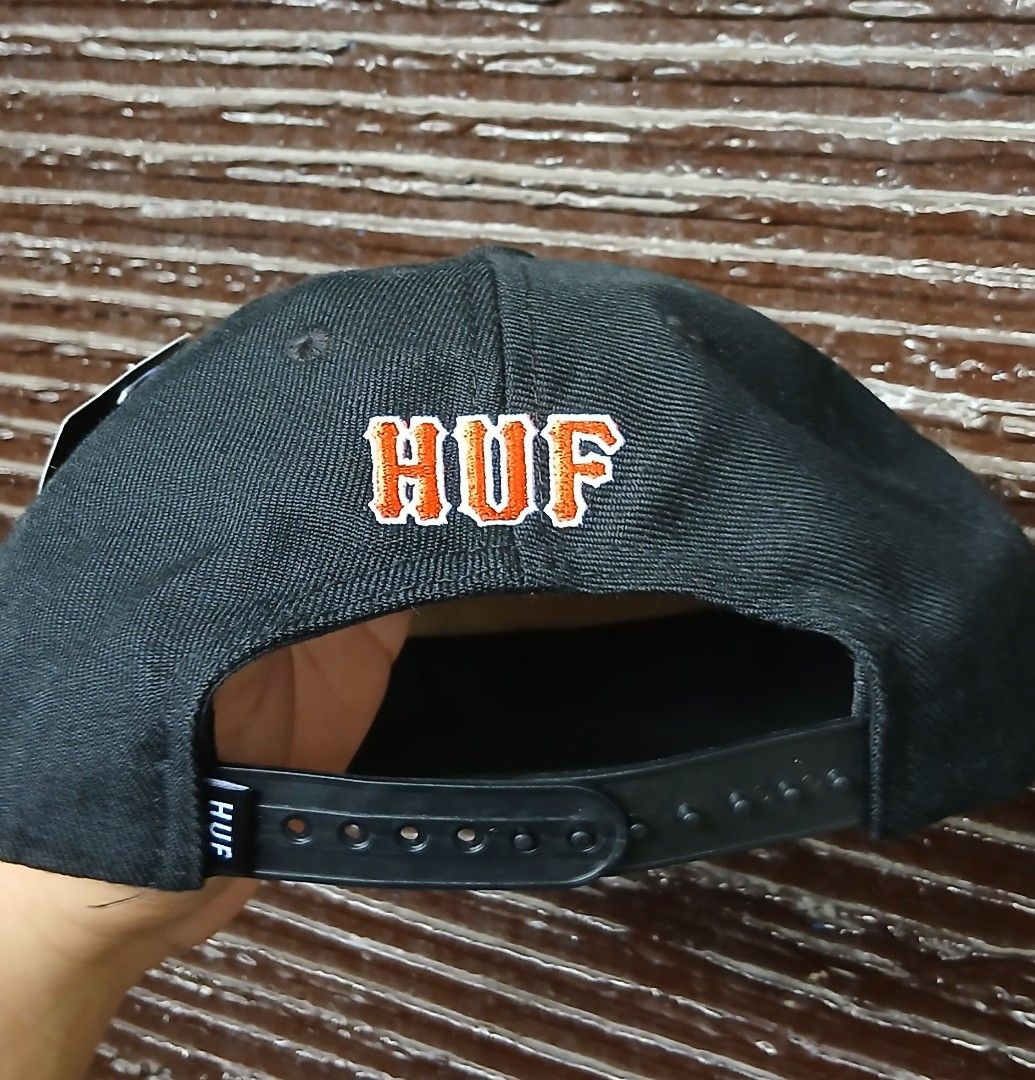 HUFWORLDWIDE 20th Anniversary Snapback Hat Black (Category: Caps & Hats) located in San Mateo. Submitted by edayz709 (Listing ID 1462045580, Image 3). Description: - Brand: HUF WORLDWIDE - Edition: 20th Anniversary - Color: Black - Style: Snapback Hat - Front Embroidery: 'Worldwide H Champions' - Back Embroidery: 'HUF' - Condition: Brand new with original tags - Sizing: One size fits all.
