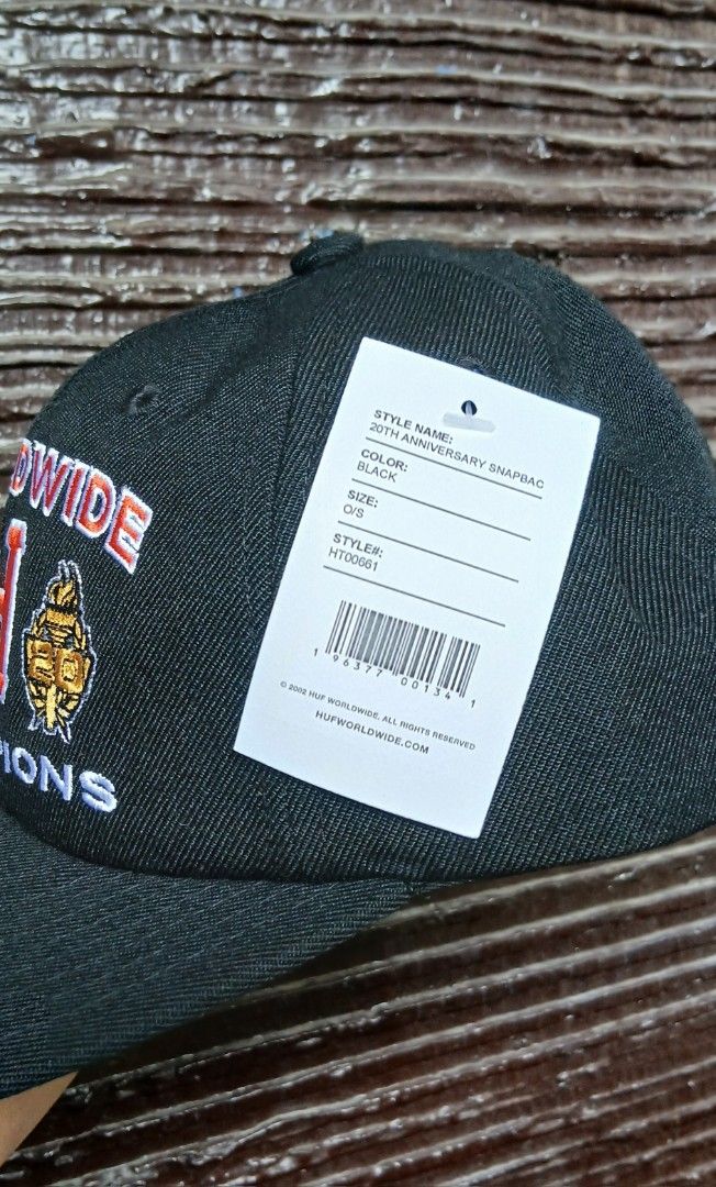 HUFWORLDWIDE 20th Anniversary Snapback Hat Black (Category: Caps & Hats) located in San Mateo. Submitted by edayz709 (Listing ID 1462045580, Image 2). Description: - Brand: HUF WORLDWIDE - Edition: 20th Anniversary - Color: Black - Style: Snapback Hat - Front Embroidery: 'Worldwide H Champions' - Back Embroidery: 'HUF' - Condition: Brand new with original tags - Sizing: One size fits all.