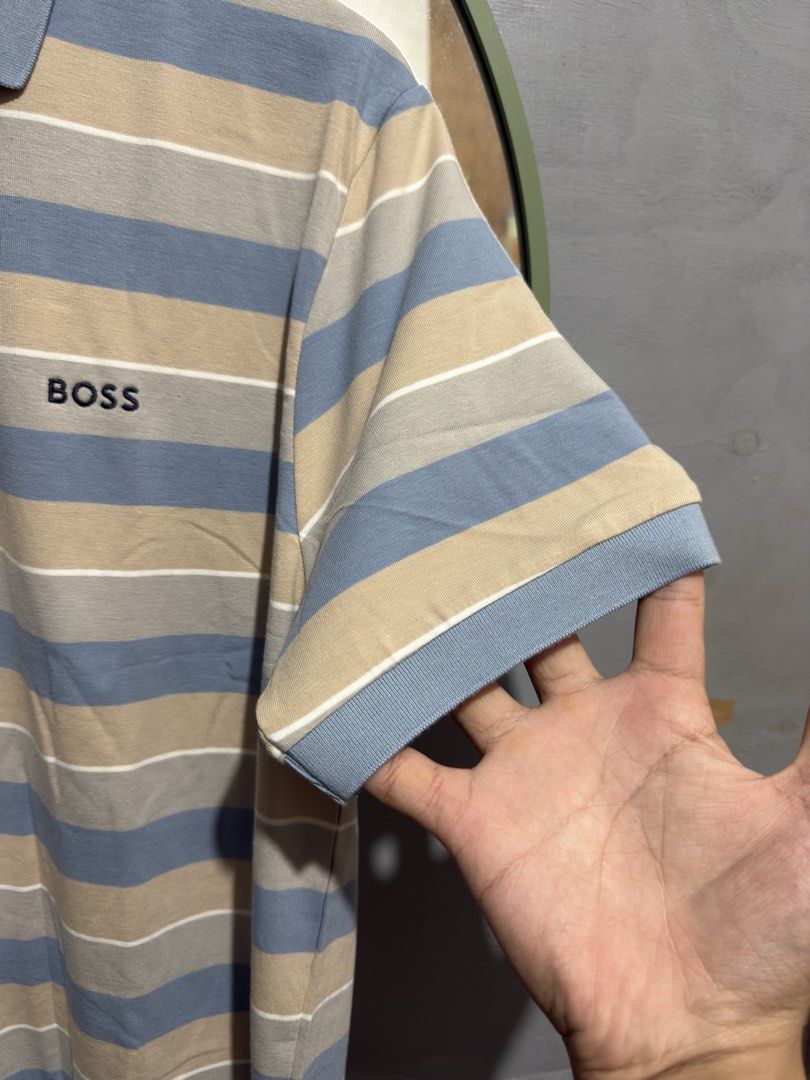Hugo Boss Polo Shirt (Category: Tshirts & Polo Shirts ) located in Manila. Submitted by tindero-ng-damit (Listing ID 1462091471, Image 3). Description: Hugo Boss Stripe Size XL fittings - 23 x 28 Like new po.