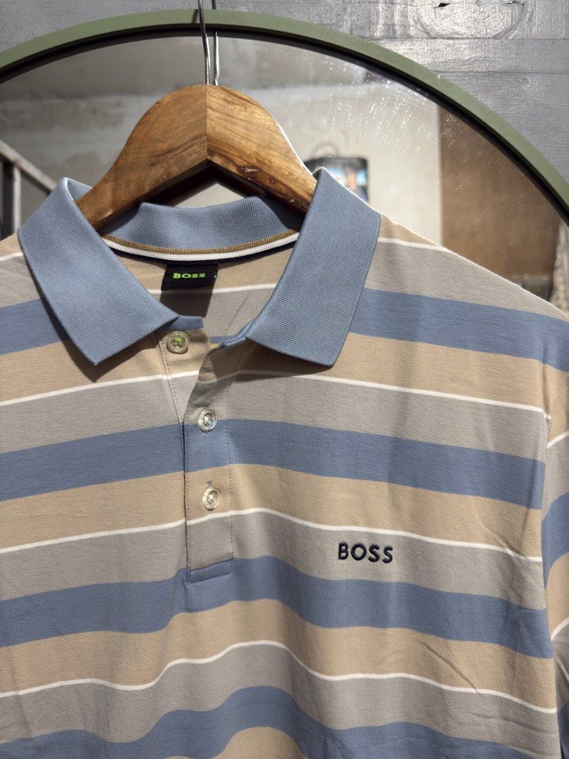 Hugo Boss Polo Shirt (Category: Tshirts & Polo Shirts ) located in Manila. Submitted by tindero-ng-damit (Listing ID 1462091471, Image 2). Description: Hugo Boss Stripe Size XL fittings - 23 x 28 Like new po.