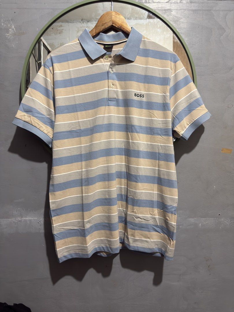 Hugo Boss Polo Shirt (Category: Tshirts & Polo Shirts ) located in Manila. Submitted by tindero-ng-damit (Listing ID 1462091471, Image 1). Description: Hugo Boss Stripe Size XL fittings - 23 x 28 Like new po.