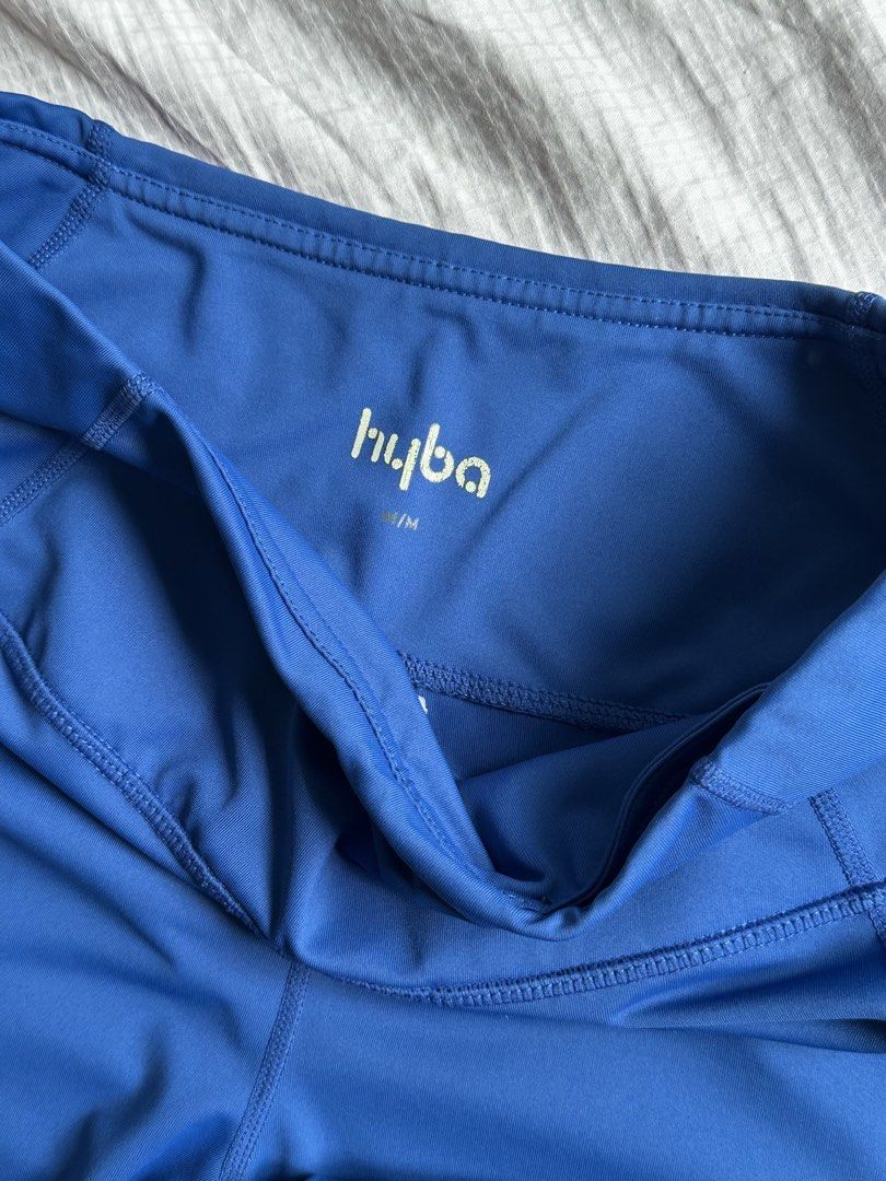 Hyba Blue Cropped Athletic Leggings Size M (Category: Activewear) located in Manila. Submitted by nfcloset_ (Listing ID 1462167547, Image 2). Description: - Hyba blue cropped leggings - Size: Medium (M) - Ideal for workouts or casual wear - Features a comfortable waistband - Stylish mesh paneling on sides and lower leg - Offers good stretch for flexibility.