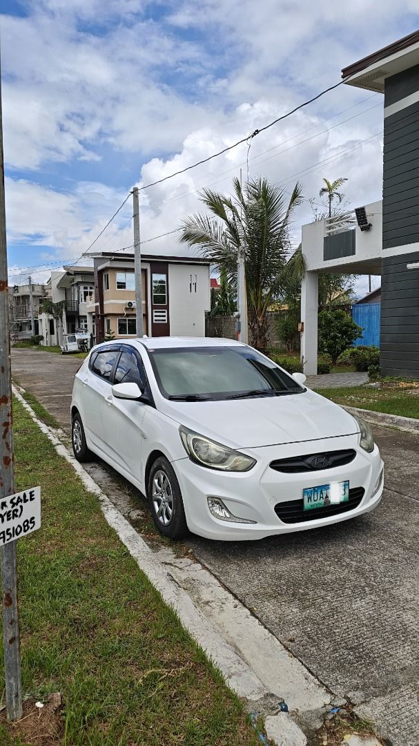 Hyundai Accent 1.5 4-Dr (M) (Category: Used Cars) located in Makati City. Submitted by danielmontinegro (Listing ID 1392497178, Image 3). Description: 2014 HYUNDAI ACCENT HATCHBACK 1.6 CRDi DIESEL ₱309,999 NEGOTIABLE 91,000 KM ORIGINAL MILEAGE • 1.6 CRDi Turbo Diesel • 6-Speed Manual • Direct Owner • Freshly Repainted Sparkling White • Ice-Cold A/C • No Engine/Suspension Issues • Newly Serviced / PMS • New Arivo Tires, Lugnuts & Hubcaps • Complet