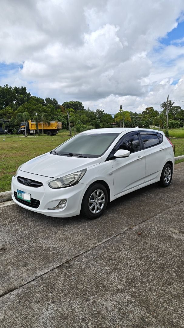 Hyundai Accent 1.5 4-Dr (M) (Category: Used Cars) located in Makati City. Submitted by danielmontinegro (Listing ID 1392497178, Image 1). Description: 2014 HYUNDAI ACCENT HATCHBACK 1.6 CRDi DIESEL ₱309,999 NEGOTIABLE 91,000 KM ORIGINAL MILEAGE • 1.6 CRDi Turbo Diesel • 6-Speed Manual • Direct Owner • Freshly Repainted Sparkling White • Ice-Cold A/C • No Engine/Suspension Issues • Newly Serviced / PMS • New Arivo Tires, Lugnuts & Hubcaps • Complet