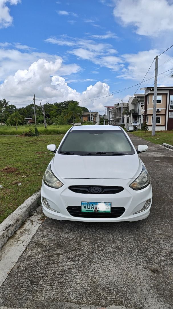 Hyundai Accent 1.5 4-Dr (M) (Category: Used Cars) located in Makati City. Submitted by danielmontinegro (Listing ID 1392497178, Image 2). Description: 2014 HYUNDAI ACCENT HATCHBACK 1.6 CRDi DIESEL ₱309,999 NEGOTIABLE 91,000 KM ORIGINAL MILEAGE • 1.6 CRDi Turbo Diesel • 6-Speed Manual • Direct Owner • Freshly Repainted Sparkling White • Ice-Cold A/C • No Engine/Suspension Issues • Newly Serviced / PMS • New Arivo Tires, Lugnuts & Hubcaps • Complet