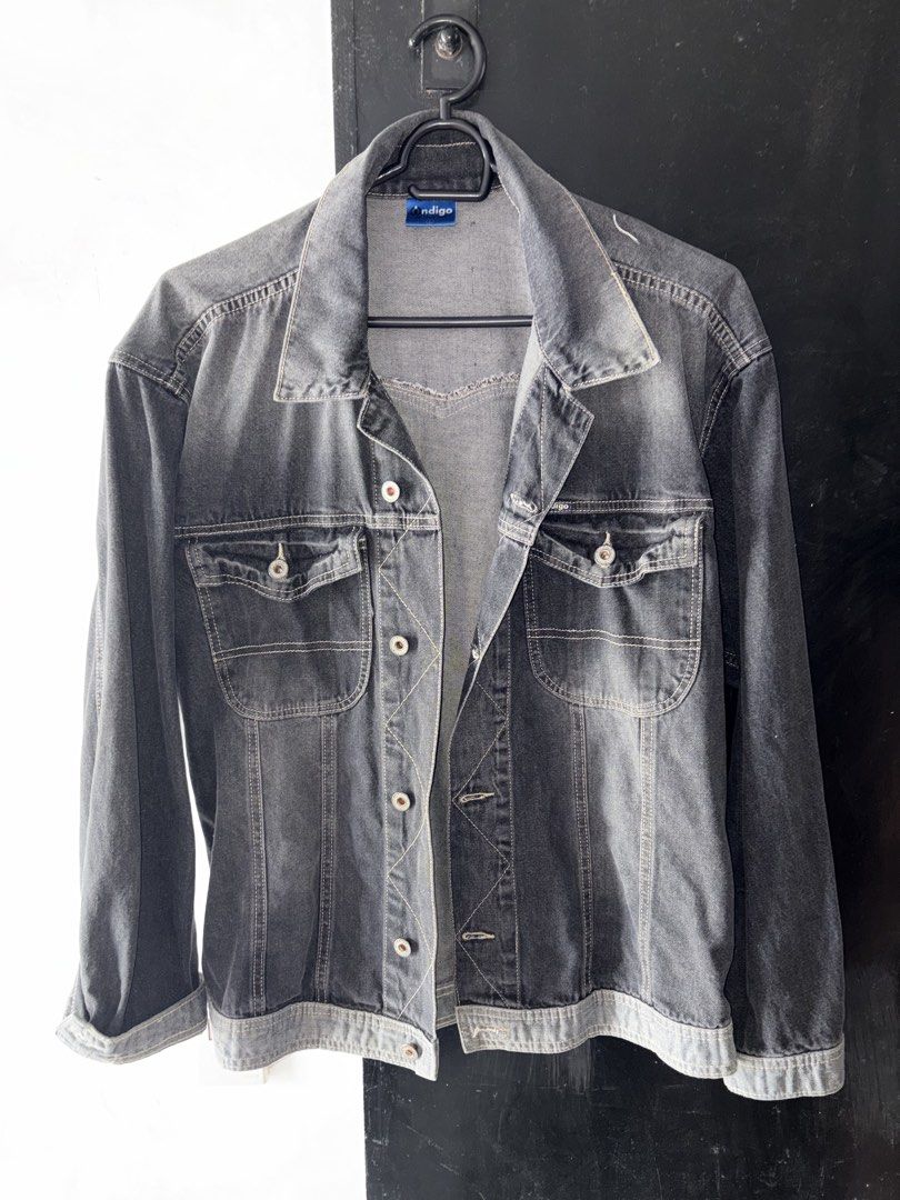 Indigo Denim Jacket - Grey Wash (Category: Coats, Jackets and Outerwear) located in Baguio. Submitted by declutterain (Listing ID 1462061268, Image 1). Description: - Grey wash denim jacket by Indigo - Classic trucker style - Button closure with chest pockets - Estimated size Medium - Ideal for layering and versatile styling.