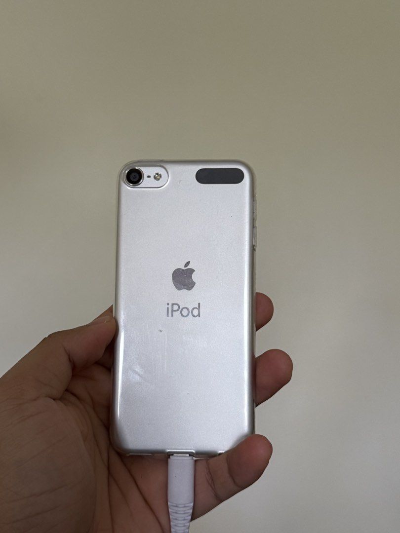 iPod Touch 6th Generation (16 GB) (Category: Other Gadgets) located in Paranaque City. Submitted by anthonyjpags (Listing ID 1462094486, Image 2). Description: Selling my iPod Touch 6th Gen. (16 GB) READ DESC. - Includes cable ONLY (no power brick) - Currently jailbroken (via Amethyst, Sileo - semi untethered jb). Can reinstall clean software w/o jailbreak - Current firmware is iOS 12.5.8 - Tempered glass installed, no significant physical issues