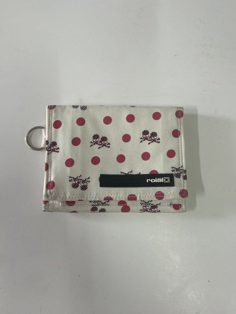 Japan brand wallet roial (Category: Wallets & Card Holders) located in Bulacan. Submitted by ourdailybreads (Listing ID 1462048498, Image 1). Description: The image shows an open white fabric trifold wallet with a woven brown label that reads “roial Garment Manufacturing Company”..