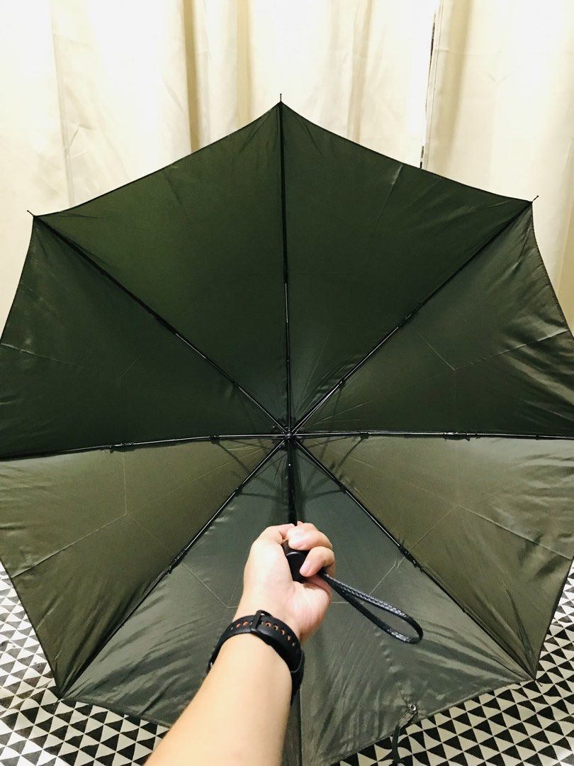 JAPAN UMBRELLA (Category: Umbrellas) located in Gamu. Submitted by 2022bagsbunny (Listing ID 1462064395, Image 3). Description: NOT FADED COLOR BROWN AND GREEN .