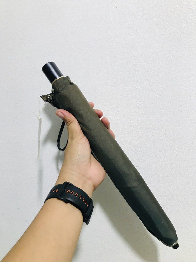 JAPAN UMBRELLA (Category: Umbrellas) located in Gamu. Submitted by 2022bagsbunny (Listing ID 1462064395, Image 1). Description: NOT FADED COLOR BROWN AND GREEN .