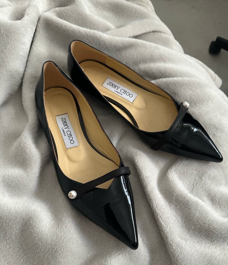 Jimmy Choo Rosalia Flat (Category: Flats & Sandals) located in San Juan City. Submitted by flipandfind (Listing ID 1462039762, Image 2). Description: - Brand: Jimmy Choo - Material: Black patent leather - Design: Pointed toe flats - Detail: Delicate strap across the front with a pearl accent - Style: Classic, chic, and versatile - Occasion: Perfect for dressing up or down - NGA (passed down item) Please check all photos before buying No box, just