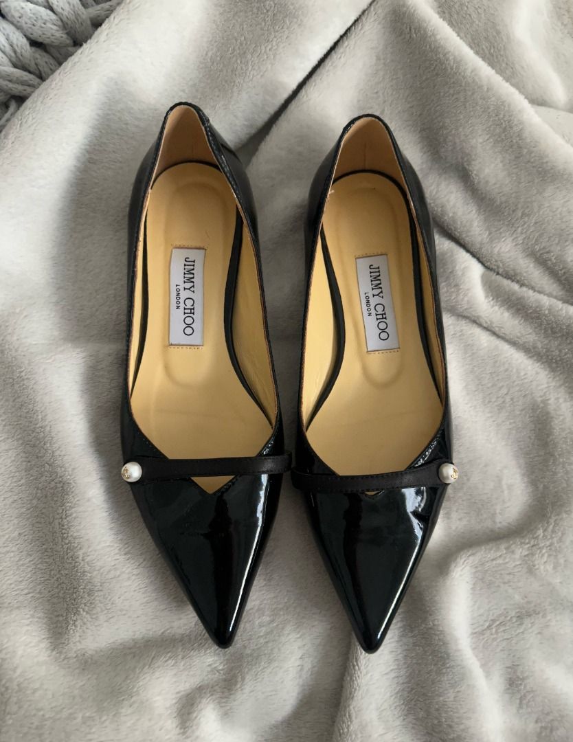 Jimmy Choo Rosalia Flat (Category: Flats & Sandals) located in San Juan City. Submitted by flipandfind (Listing ID 1462039762, Image 1). Description: - Brand: Jimmy Choo - Material: Black patent leather - Design: Pointed toe flats - Detail: Delicate strap across the front with a pearl accent - Style: Classic, chic, and versatile - Occasion: Perfect for dressing up or down - NGA (passed down item) Please check all photos before buying No box, just