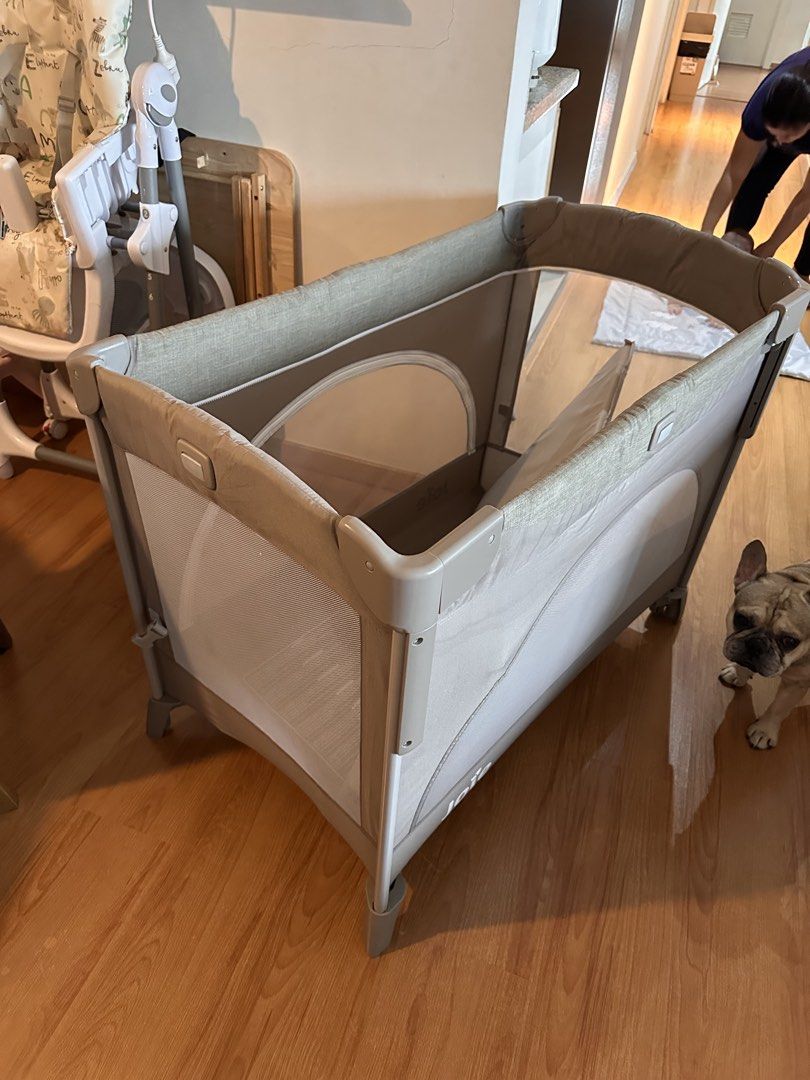Joie Playpen Baby Cot (Category: Cots & Cribs) located in Mandaluyong City. Submitted by betterchelle (Listing ID 1462093292, Image 1). Description: - Joie brand playpen - Includes mattress and cute sheep-themed bedding set - Mesh sides for excellent ventilation - Comes with a mobile featuring hanging toys - Folds compactly for convenient storage - Ideal for baby's naps and playtime.