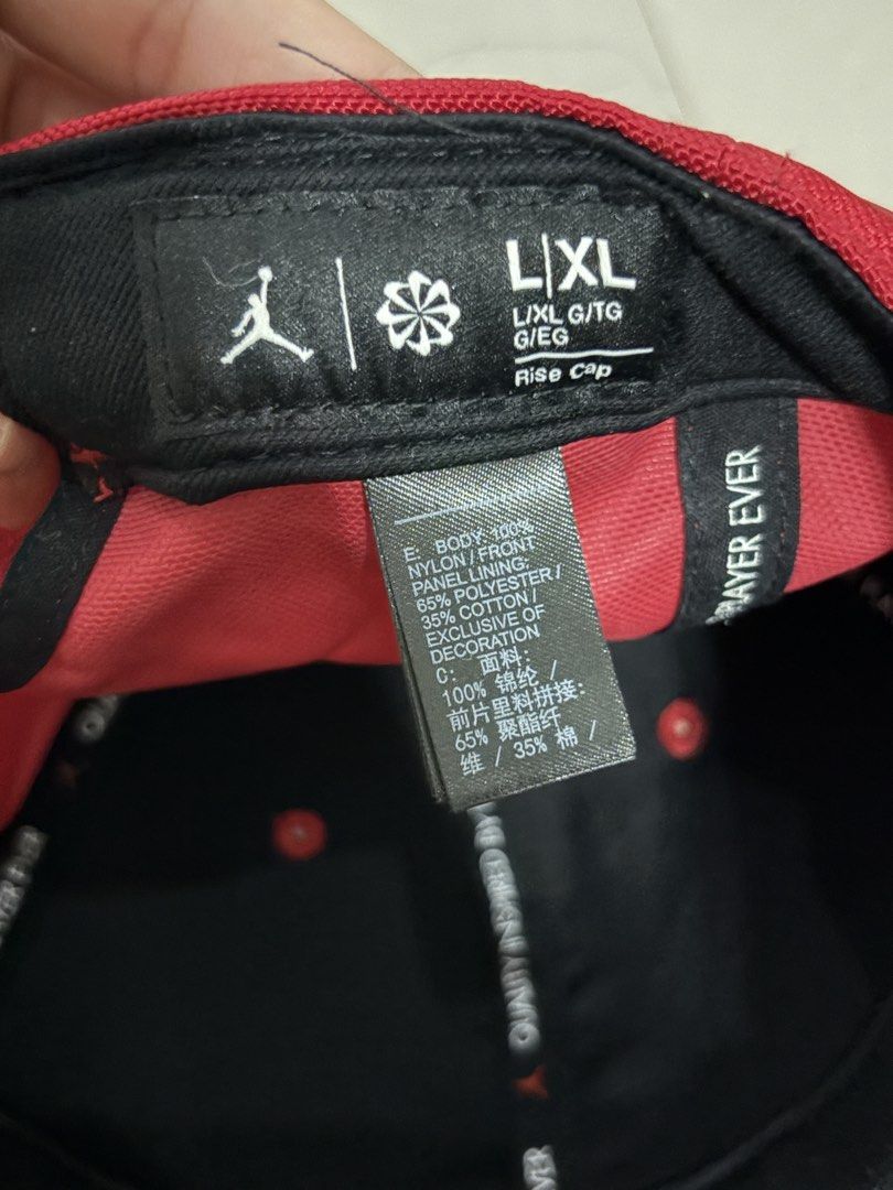 Jordan Rise Cap Red Black L/XL (Category: Caps & Hats) located in Manila. Submitted by earleacurato (Listing ID 1462182755, Image 3). Description: - Classic red Jordan cap - Features iconic black Jumpman logo on the front - Adjustable strap at the back with Jordan branding - Size: L/XL - Material: Nylon and polyester blend - Ideal for everyday wear.