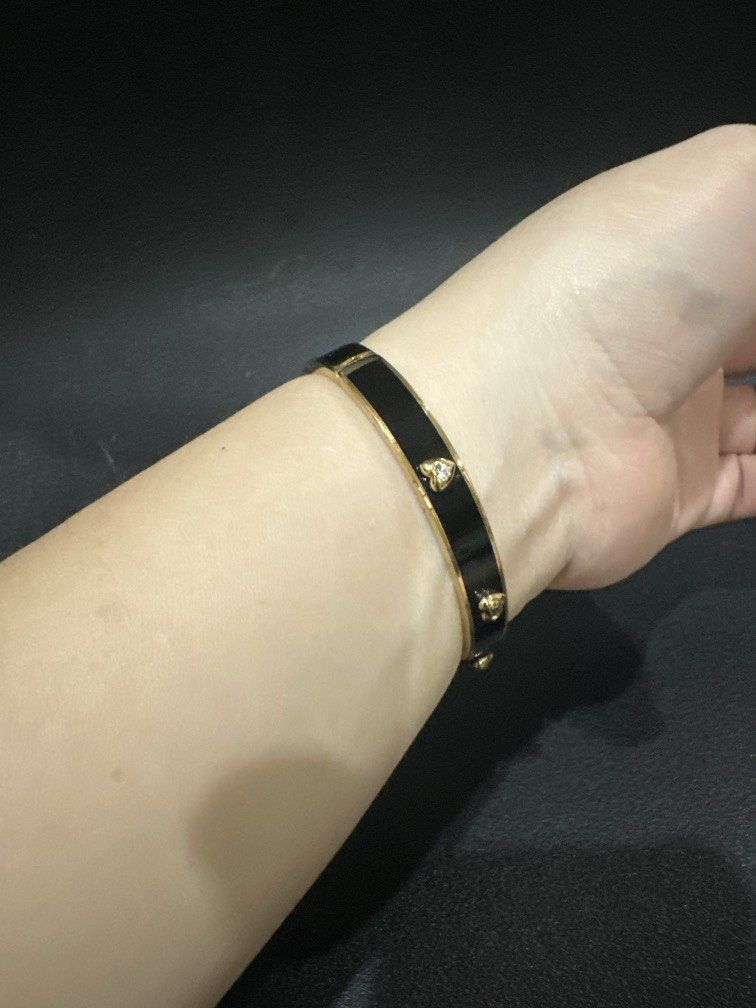 Juicy Couture Bangle (Category: Bracelets) located in Manila. Submitted by krystalchewey_ (Listing ID 1462145927, Image 3). Description: Almost NEW Actual Photo Posted 2200php Bangle .