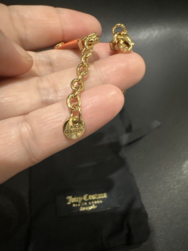 Juicy Couture bracelet (Category: Bracelets) located in Manila. Submitted by krystalchewey_ (Listing ID 1462149413, Image 2). Description: Bnew Actual Photo Posted 1500 php Bracelet Orange and gold.