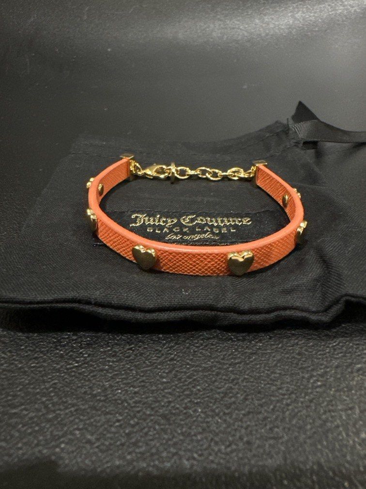 Juicy Couture bracelet (Category: Bracelets) located in Manila. Submitted by krystalchewey_ (Listing ID 1462149413, Image 1). Description: Bnew Actual Photo Posted 1500 php Bracelet Orange and gold.