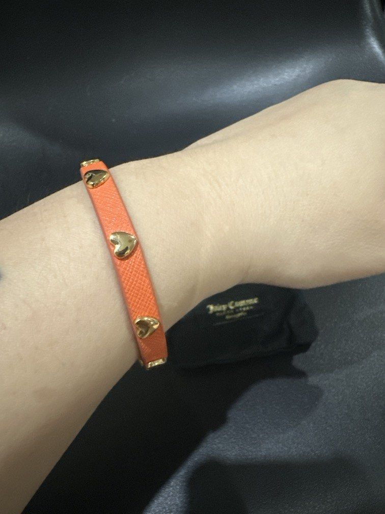 Juicy Couture bracelet (Category: Bracelets) located in Manila. Submitted by krystalchewey_ (Listing ID 1462149413, Image 3). Description: Bnew Actual Photo Posted 1500 php Bracelet Orange and gold.