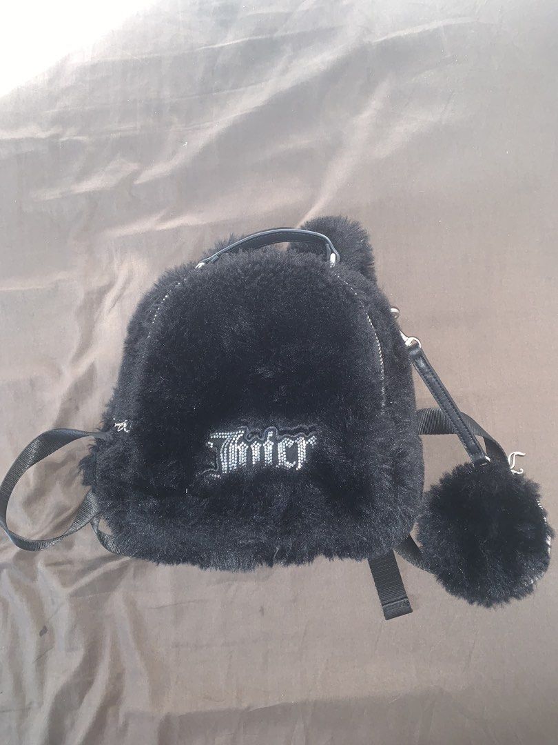 juicy couture mini bagpack bought in UK (Category: Backpacks) located in Manila. Submitted by slayandchic (Listing ID 1462195594, Image 2). Description: in excellent condition original first owner with sling and coin purse.