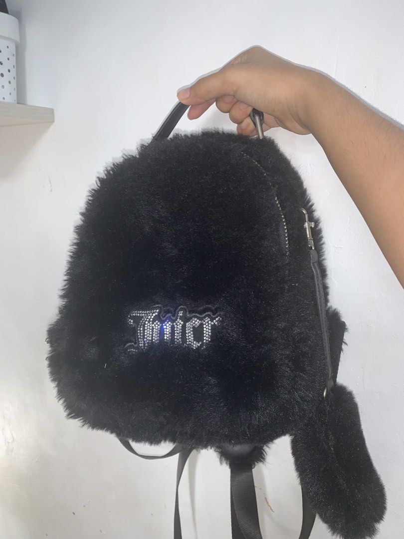 juicy couture mini bagpack bought in UK (Category: Backpacks) located in Manila. Submitted by slayandchic (Listing ID 1462195594, Image 1). Description: in excellent condition original first owner with sling and coin purse.