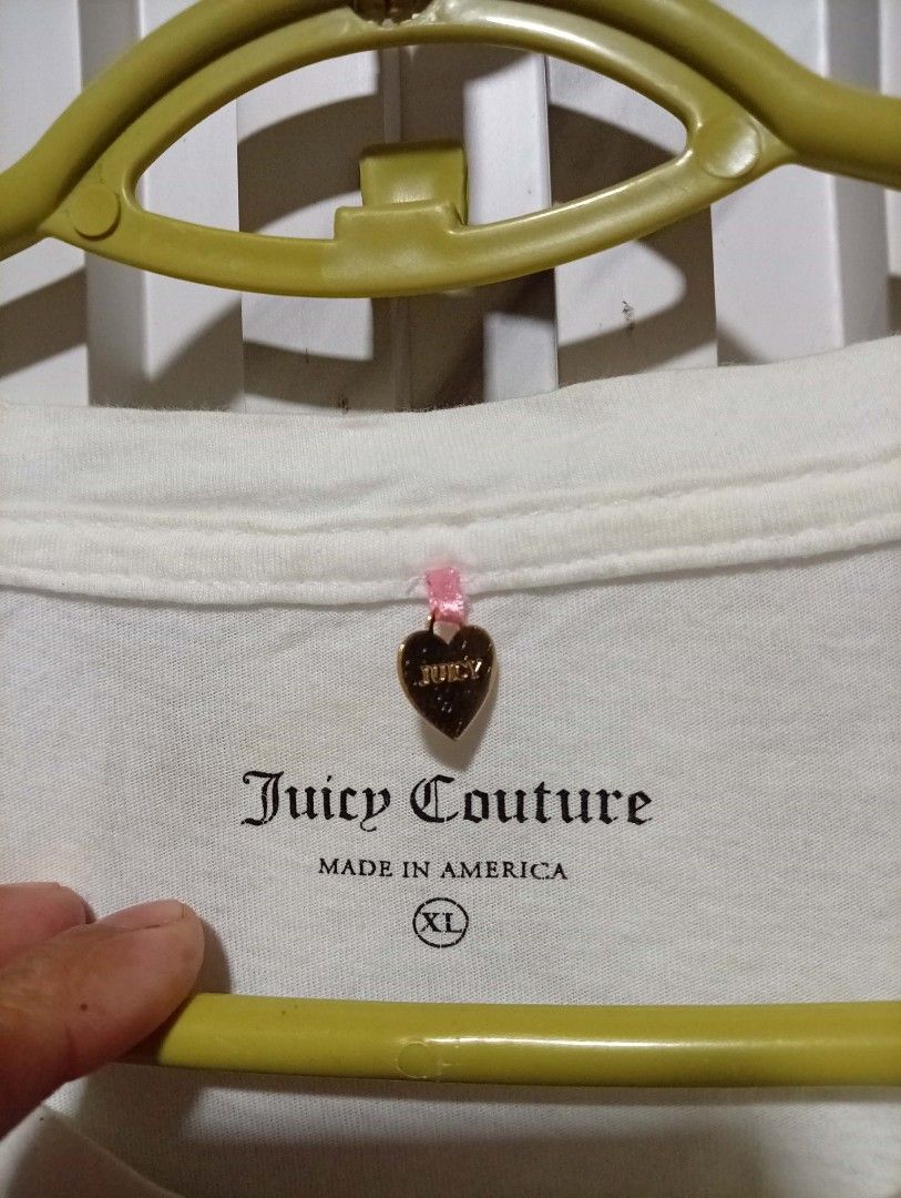 Juicy Couture tops womens ( Authentic ) (Category: Blouses) located in Barotac Nuevo. Submitted by john.pritz (Listing ID 1462112991, Image 3). Description: Juicy Couture tops womens ( Authentic ) like new condi no issue XL on tag width 16 length 27.