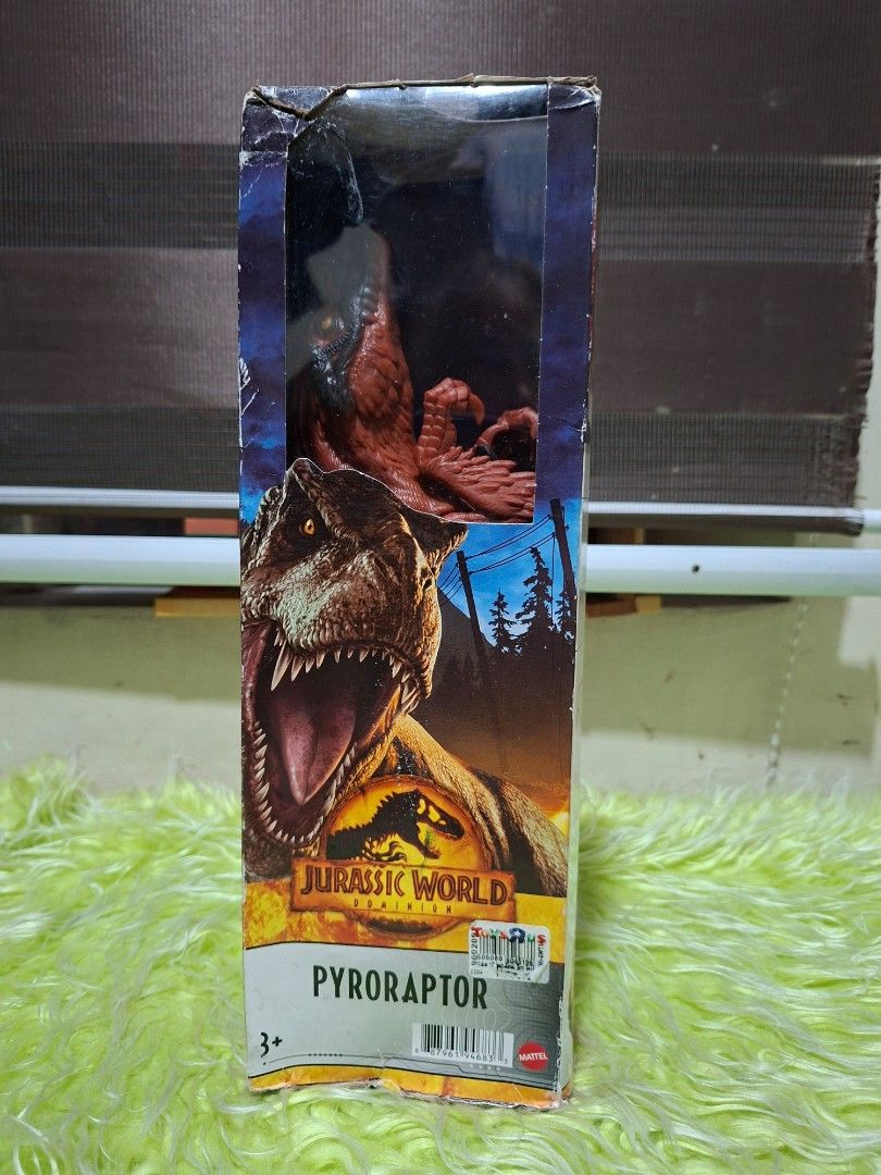 Jurassic World "Pyroraptor" Action Figure (Category: Figurines & Statues) located in Manila. Submitted by happywindmarlyn (Listing ID 1462179295, Image 1). Description: -This particular product is the 12-inch basic assortment figure from the Jurassic World Dominion film toy line. -It features standard articulation points (arms, legs, and tail) and showcases the distinct, vibrant red and black feathered design..