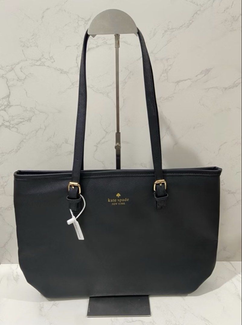 Kate Spade Bag (Category: Tote Bags) located in Pasig City. Submitted by ilmsf (Listing ID 1462166470, Image 1). Description: - Like new - Used Twice only - Classic black tote bag from Kate Spade New York - Convenient zip pocket on the back exterior - Ideal for everyday essentials and professional use .