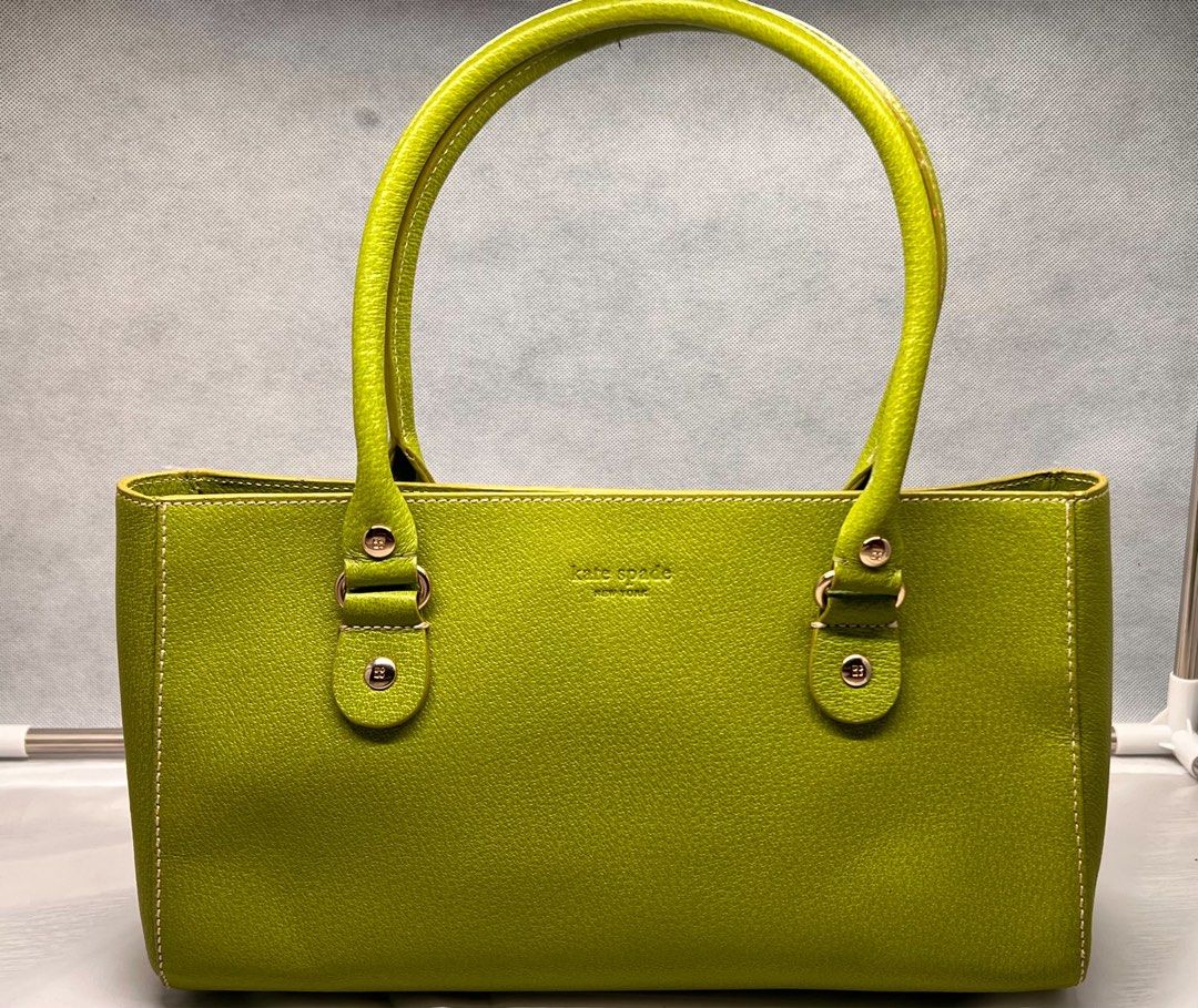 Kate Spade Lime Green Pebbled Leather Shoulder Bag (Category: Tote Bags) located in Mandaluyong City. Submitted by fayeee_26 (Listing ID 1462084606, Image 1). Description: - Brand: Kate Spade New York - Color: Green - Material: Textured Leather - Features: White contrast stitching, double top handles, gold-tone hardware - Style: Classic, chic, versatile - Ideal for: Everyday use, special occasions PRICE SLIGHTLY NEGOTIABLE .