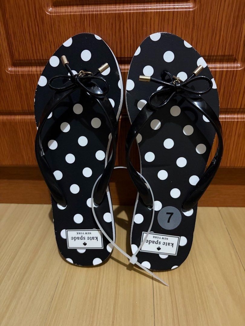 Kate Spade Polka Dot Flip Flop Size 7 (Category: Slippers and slides) located in Quezon City. Submitted by beckyshop2024 (Listing ID 1462257636, Image 1). Description: - Brand new - Original from US - Color: Black and White - Features Black Bow and Spade Charm with Gold-tone Hardware - With few dents due to shipping from US via sea cargo.