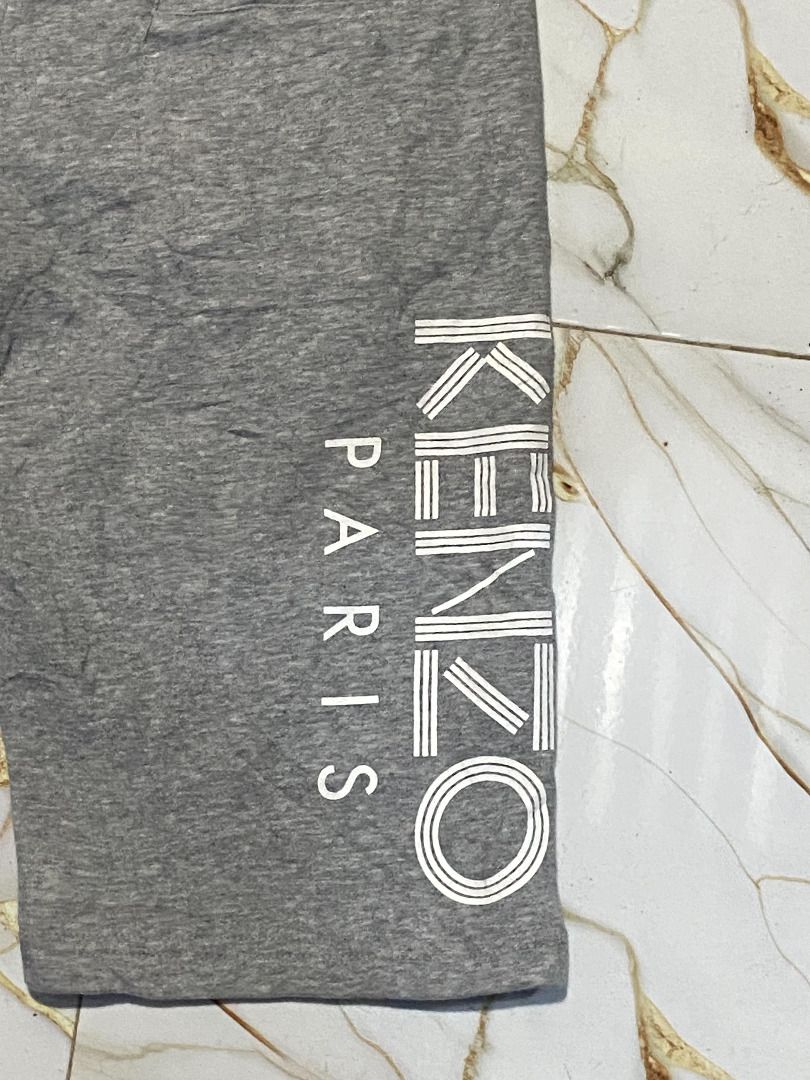 Kenzo Paris Grey Logo Shorts (Category: Shorts) located in Tuguegarao City. Submitted by llvd08secondary (Listing ID 1462211880, Image 3). Description: - Grey Kenzo Paris Shorts - Size: L - Kenzo Paris logo detail on the side - Made in Portugal - Comfortable material, perfect for casual outings.