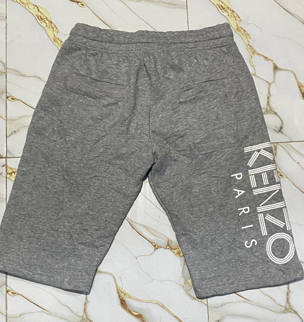 Kenzo Paris Grey Logo Shorts (Category: Shorts) located in Tuguegarao City. Submitted by llvd08secondary (Listing ID 1462211880, Image 2). Description: - Grey Kenzo Paris Shorts - Size: L - Kenzo Paris logo detail on the side - Made in Portugal - Comfortable material, perfect for casual outings.