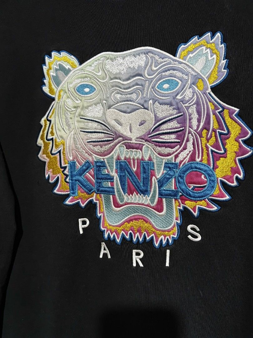 KENZO PULLOVER SWEATSHIRT (Category: Coats, Jackets and Outerwear) located in Muntinlupa City. Submitted by nofame12 (Listing ID 1462160958, Image 2). Description: 1 Very minimal pinhole PLEASE CHECK THE DETAILS OF THE ITEM ON FIRST PHOTO. LOCATION - SUCAT MUNTINLUPA CITY.