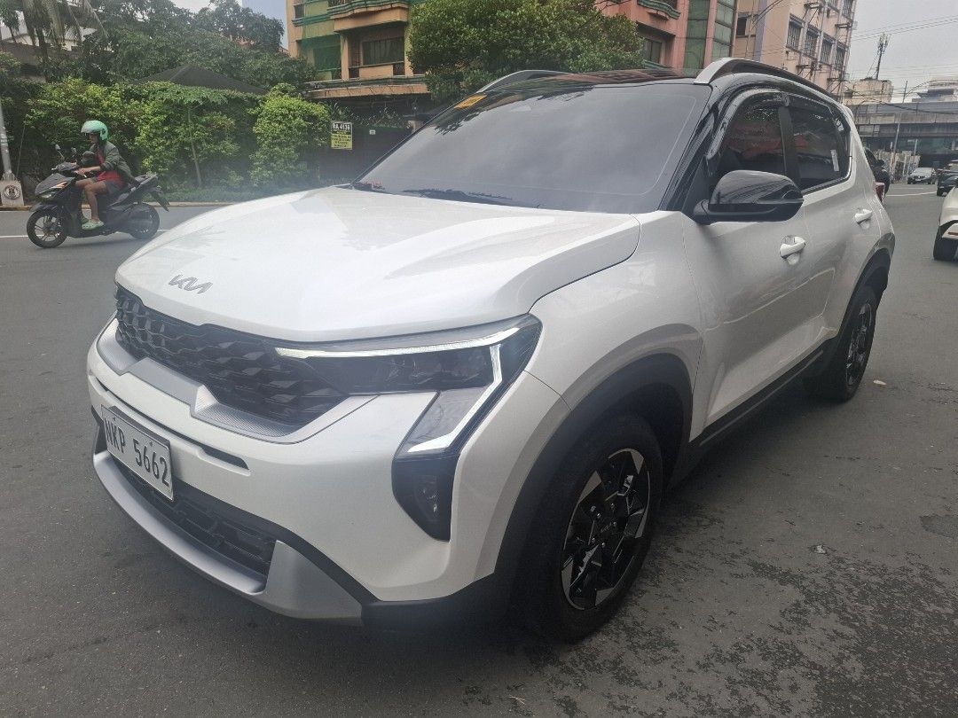 Kia Sonet SX Auto (Category: Used Cars) located in Manila. Submitted by rammie.bullicer (Listing ID 1462056649, Image 2). Description: 🚘 Kia Sonet SX 2025 🚘 ‼️865k (negotiable)‼️ ✔️ 1st Owned ✔️ Top of the Line ✔️ Automatic Transmission ✔️ Push Start with 2 OEM Smart Keys ✔️ OEM Biege Leather seats ✔️ Sun Roof ✔️ Bnew deep dish Matting ✔️ 10k Original Mileage casa Maintained ✔️ Bnew Trunk Tray ✔️ Bnew Wide Rear View Mirror ✔️ Bnew Sun/Rain Viso