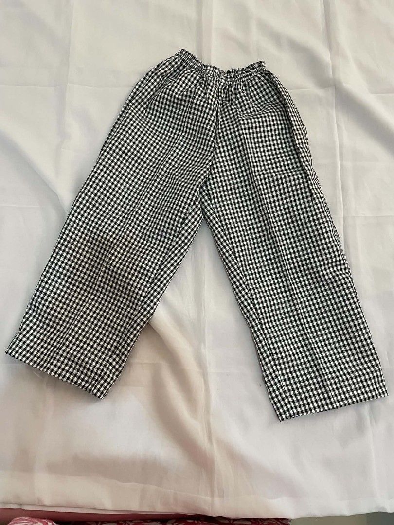 Kids Chef Uniform Set - White Jacket and Gingham Pants (Category: Babies & Kids Fashion) located in Makati City. Submitted by primadonna00 (Listing ID 1462261434, Image 2). Description: - Adorable chef uniform for kids - White double-breasted jacket with black buttons and gingham trim - Matching gingham pants with elastic waistband - Ideal for dress-up and imaginative play - Estimated size for children aged 5-7 years (check measurements for best 