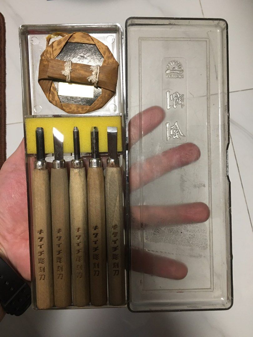 Kikuichi Wood Carving Chisel Set (Category: Craft Supplies & Tools) located in Pasay City. Submitted by gilbertso62551 (Listing ID 1462145380, Image 3). Description: - Set of 5 Kikuichi wood carving chisels - Features wooden handles and durable metal blades - Includes a variety of blade shapes for diverse carving needs - Ideal for detailed wood carving projects - Made in Taiwan - Comes in a clear plastic case with yellow foam insert for storage -