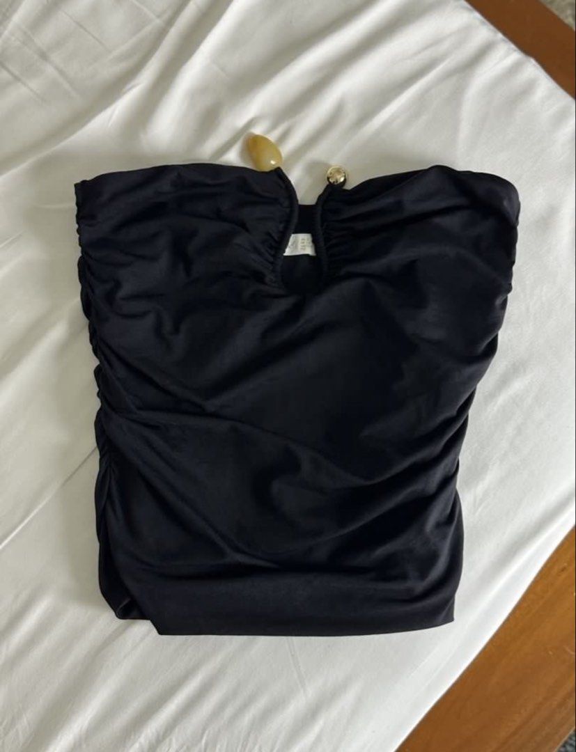 Kookai Tayla Tube Top (Category: Sleeveless) located in Quezon City. Submitted by yippeegirl (Listing ID 1462074316, Image 3). Description: - Kookai tayla black ruched tube top - Features a cut-out with gold and stone embellishments rfs: decluttering reposting as i accidentally marked sold the og listing !.